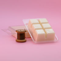 A set of Six Cubed Melts stuff with fragrance..